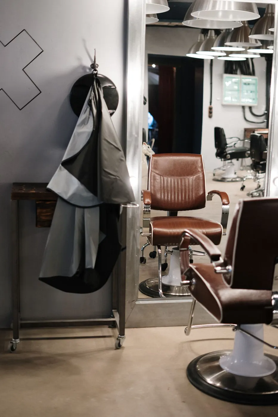 Empty barber chairs in a quiet shop